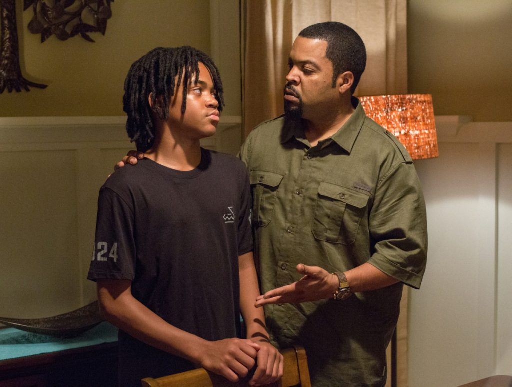 AP PROVIDES ACCESS TO THIS HANDOUT PHOTO TO BE USED SOLELY TO ILLUSTRATE NEWS REPORTING OR COMMENTARY ON THE FACTS OR EVENTS DEPICTED IN THIS IMAGE. THIS IMAGE MAY ONLY BE USED FOR 14 DAYS FROM TIME OF TRANSMISSION; NO ARCHIVING; NO LICENSING. In this image released by Warner Bros., Michael Rainey Jr., left, and Ice Cube appear in a scene from "Barbershop: The Next Cut." (Chuck Zlotnick/Warner Bros. via AP)